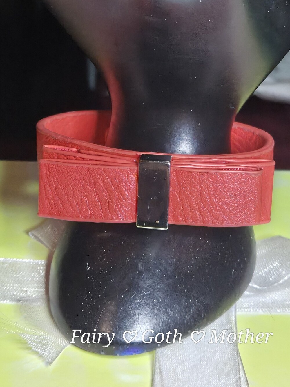 BCBGeneration "Bow Wow Wow" Coral Vegan Leather Bracelet.